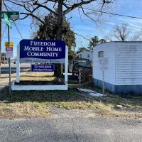 Freedom Mobile Home Community ico