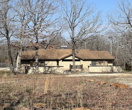 Piercing Arrow Shower House