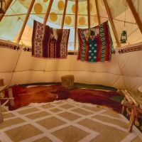 Teepees by the River ico